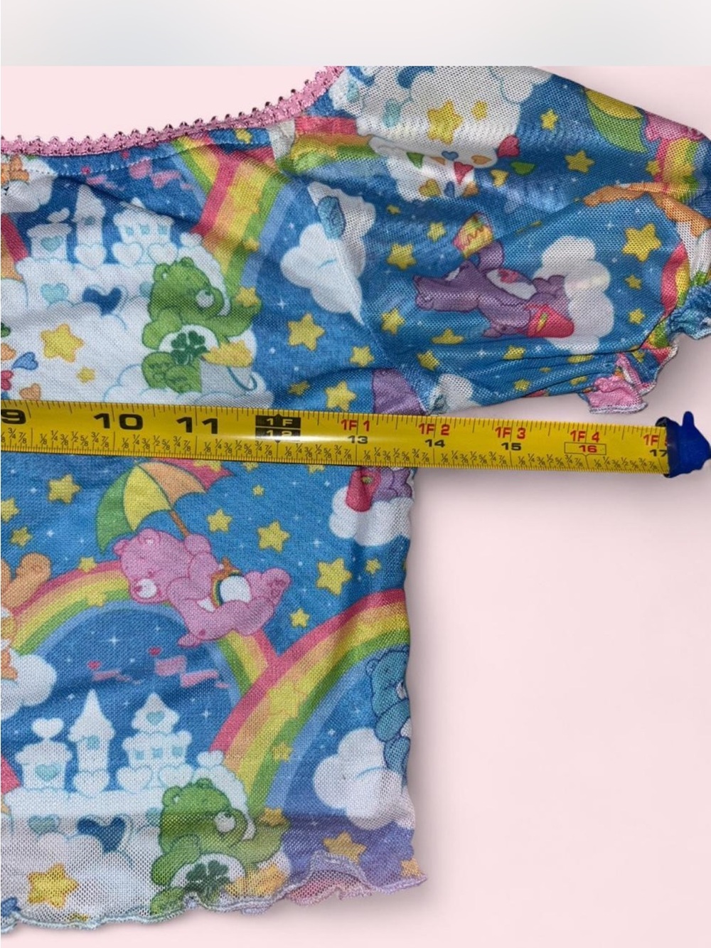 Dolls Kill x Care Bears Blue Rainbow Print Crop Top with Pink Trim - Picture 6 of 7